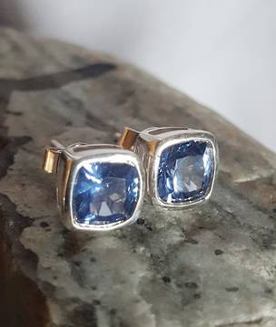 Sterling silver synthetic sapphire stud earrings