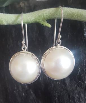 Large white mabe pearl earrings