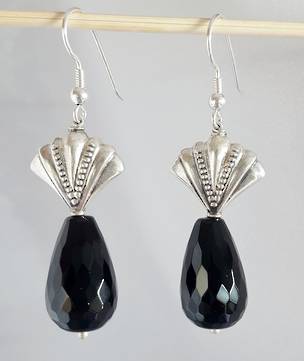 Silver earrings with facet cut onyx beads