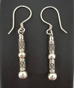 Long silver earrings with stunning designs