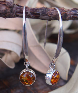 Silver amber earrings on long stems