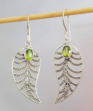 Silver lace leaf earrings with peridot