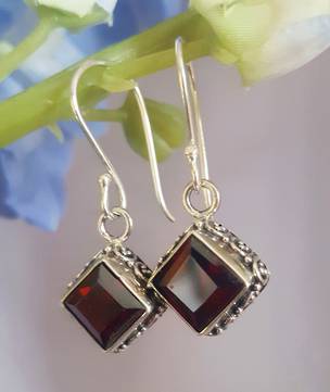 Sterling silver garnet earrings with filigree detailing