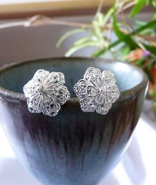 Silver flower stud earrings