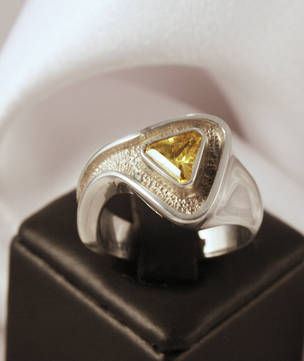 Sterling silver ring with golden yellow stone