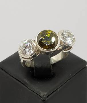 Silver synthetic perdiot ring with two cz